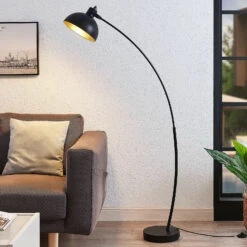 Bogenstehlampe Phileas In Schwarz Und Gold